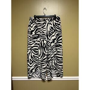 Girl With Curves collection, Zebra Print Tulip Hem Crop Pants.